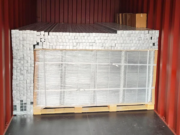 Several pieces of 3D fence posts in the container.