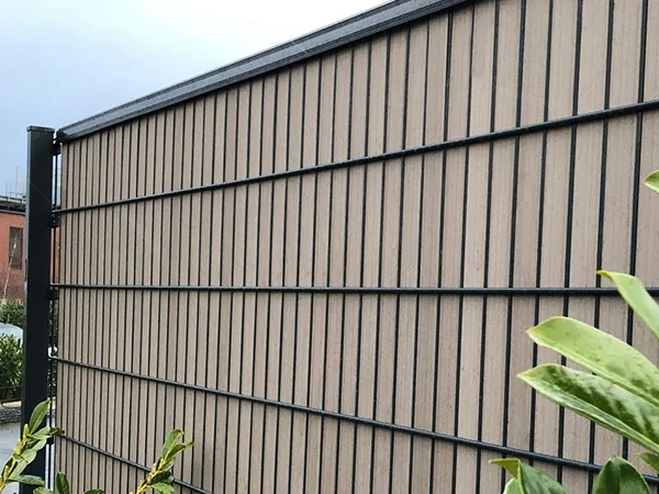 The 2D fences with privacy slats are installed in the residence.