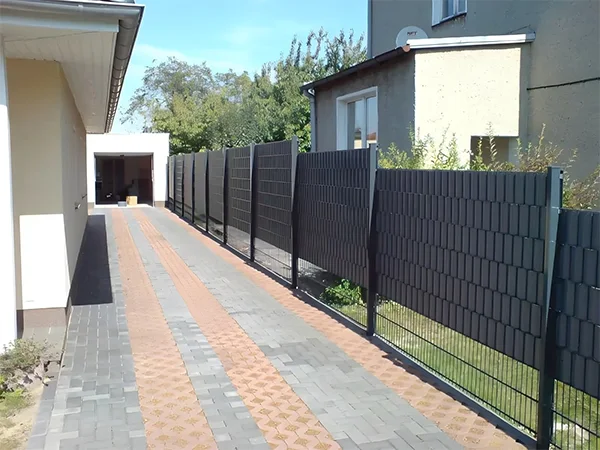 The 2D fences with privacy slats are installed in the residence.