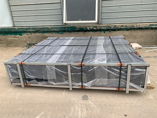 Several metal pallets of 2D fence in the warehouse.