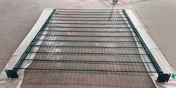 A assembled 2D fence on the ground.