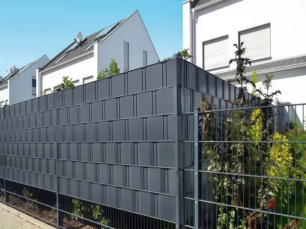 2D privacy fence with privacy slats installed along a residential garden.