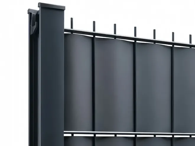 2D privacy fence with privacy slats installed beside the fence post.