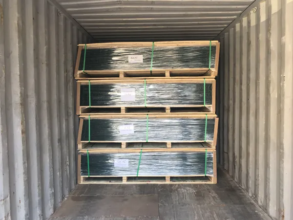 Palletized 358 high security fence panels are loaded inside shipping container.