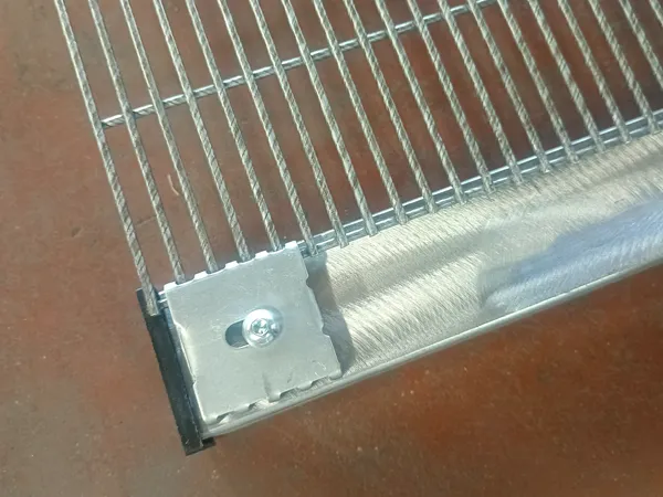 Close up shows clip assembly structure of 358 high security fence.