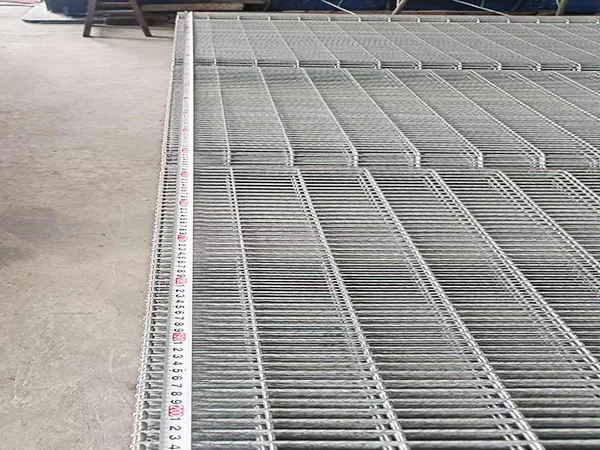 A QC worker is measuring the panel height of 358 high security fence.