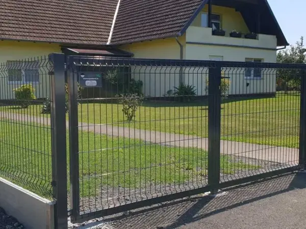 The green 3D security fences are surrounding the villa.
