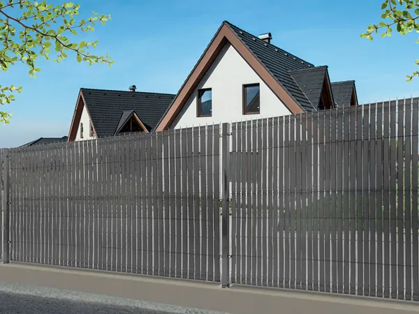 3D privacy fence with privacy tape installed along a residential property boundary.