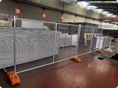 The side view of American chain link temporary fence in warehouse.