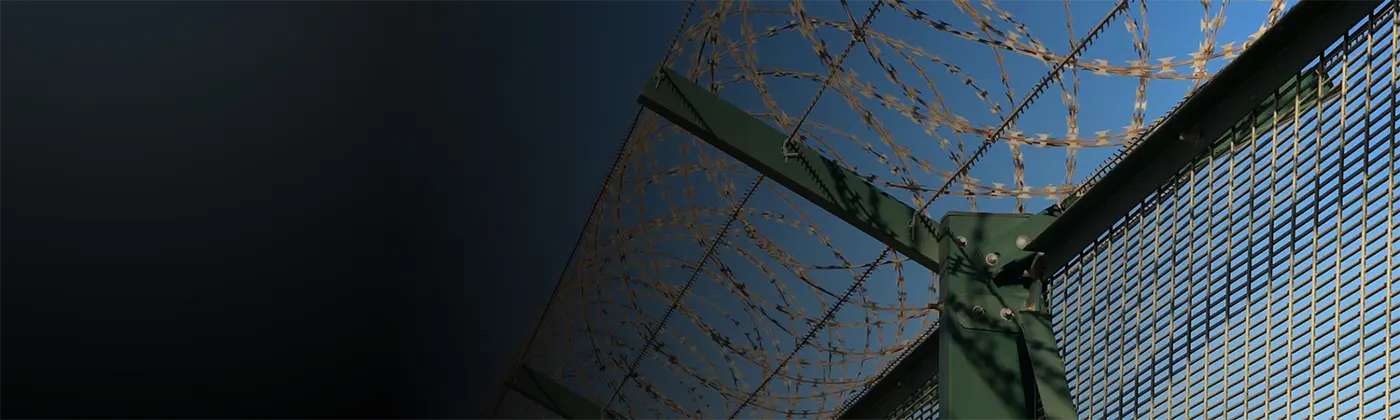 A security fence on blue background.