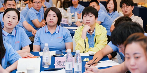 Lisa and Amy and other members are listening to the training.