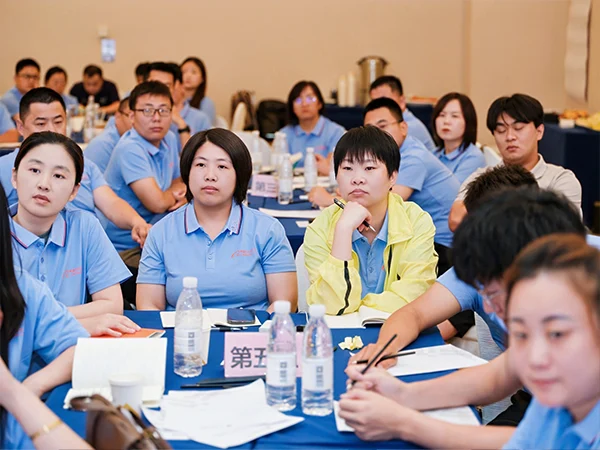 Lisa and Amy and other members are listening to the training.