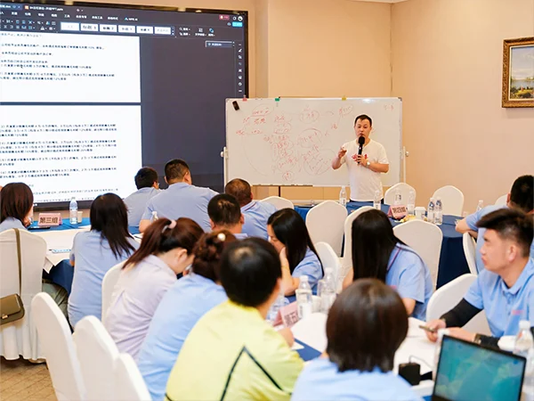 The lecturer is explaining the changes brought by AI.