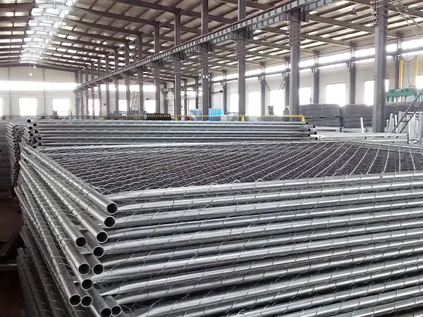 Several pieces of American temporary fencing panels in warehouse.