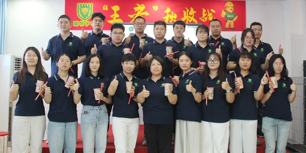 All sales representatives holding a cup of milk tea.