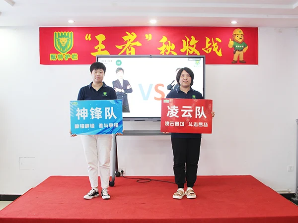 Two team representatives standing on the stage.