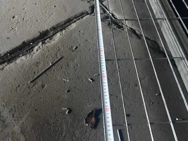Workers are measuring the length of Canada temporary fence panels.