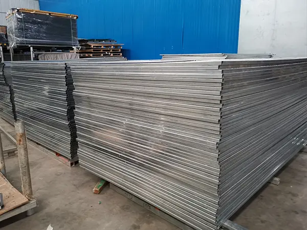 Several pieces of Canada temporary fencing panels are in bulk package.