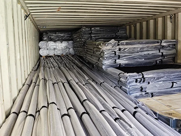 several chain link fence posts in the container.