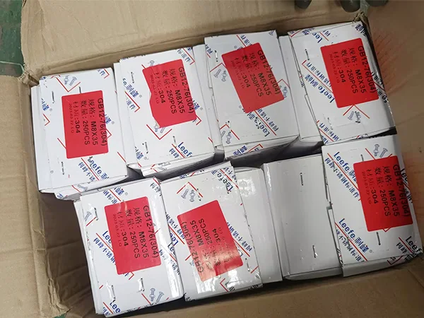 Several small cartons of chain link fence accessories in the carton.