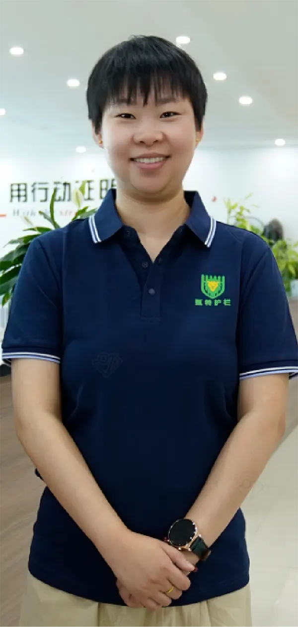 A sales representative is standing beside of the table with smile.