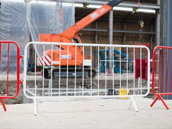 The crowd control barriers are placed at the construction site.