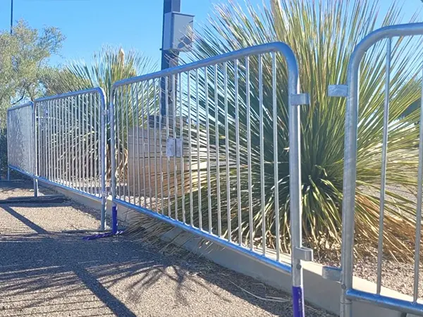 The crowd control barriers are placed on the roadside.