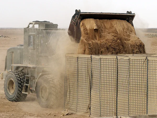The forklift is filling sands into defensive barriers.