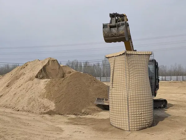 Defensive barrier load-bearing capacity test with excavator loading sand.
