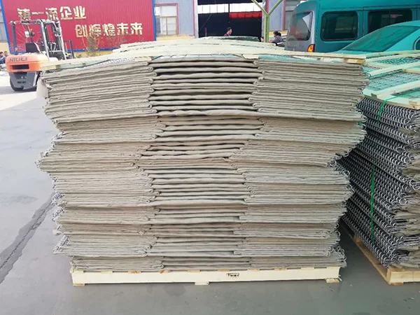 Several defensive barriers are placed on the wooden pallet.