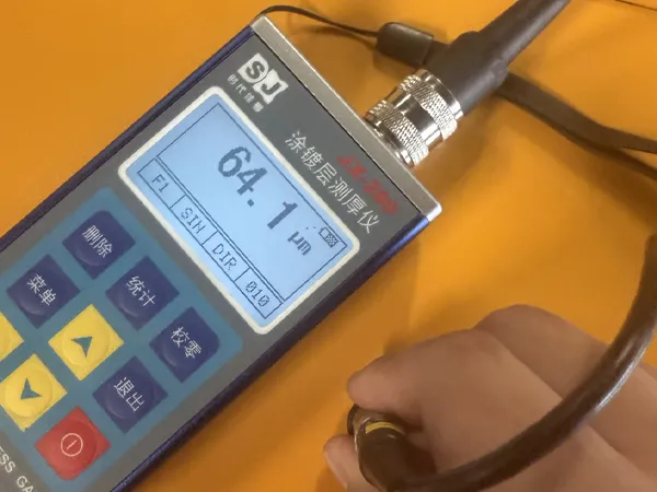 Detecting object surface coating thickness; current measurement displayed is 64.1 μm