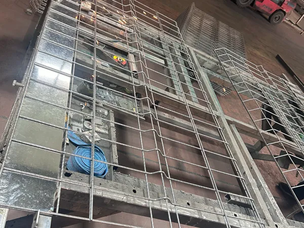 Edge protection fence frame being welded in factory.