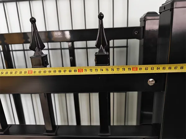 A QC worker is measuring the fence gate width of sliding fence gate.