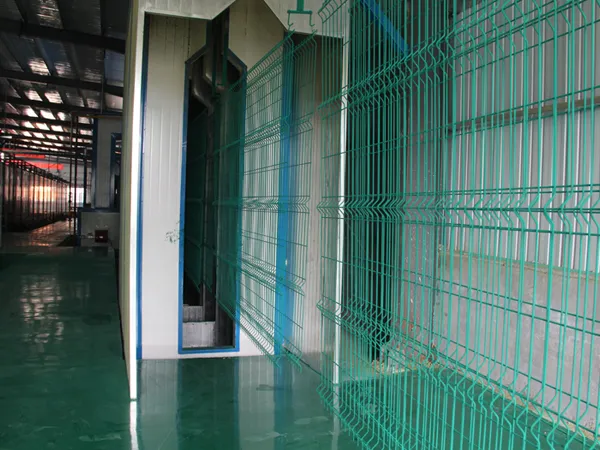 Powder-coated 3D fence panels are drying in the rack.