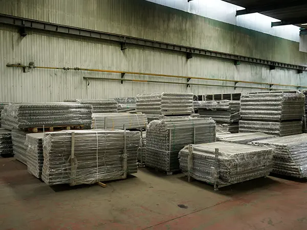 Several fence posts are packed with waterproof films.