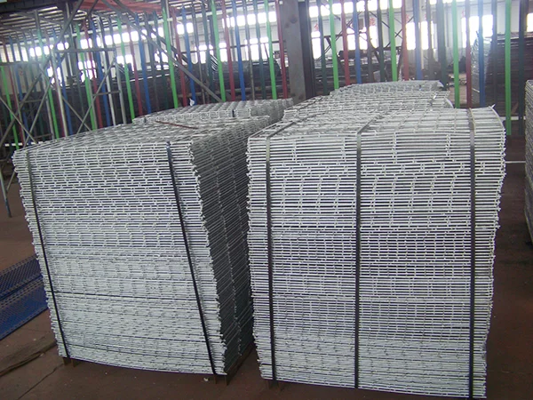 Two metal pallets of welded gabion retaining wall panels in the warehouse.
