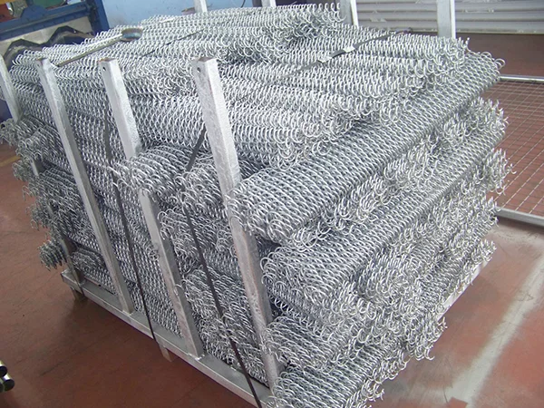A metal pallet of welded gabion retaining wall spring wires in the warehouse.