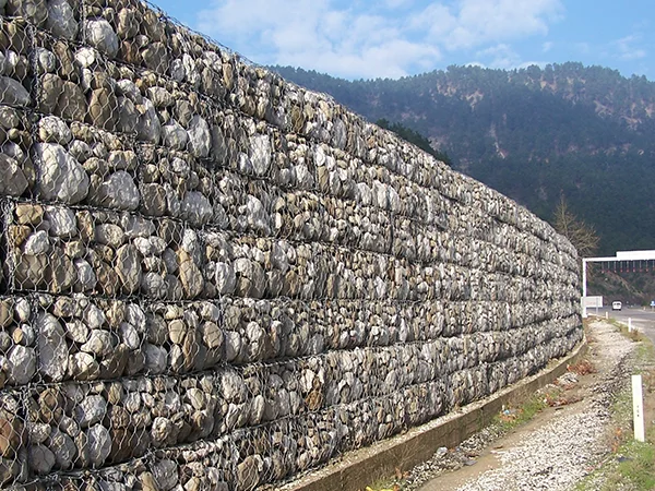 The woven gabion retaining walls are installed at the roadside.