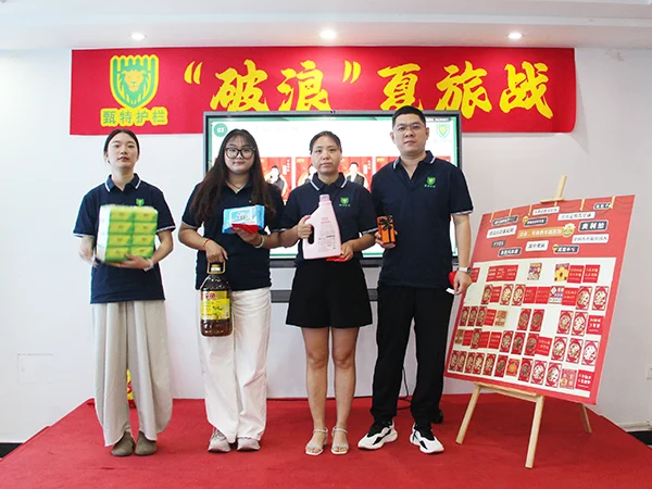 The outstanding employees are holding the award.