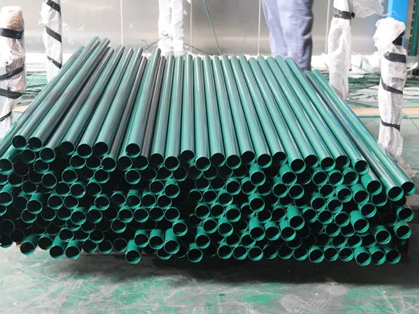 A freshly powder-coated fence post in the workshop