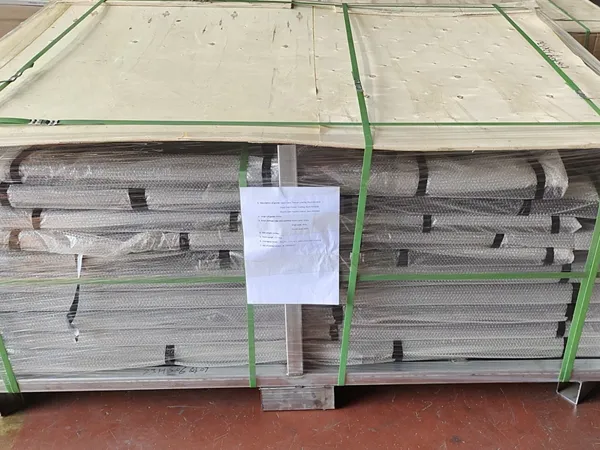 Privacy fence panels secured in metal pallet packaging.