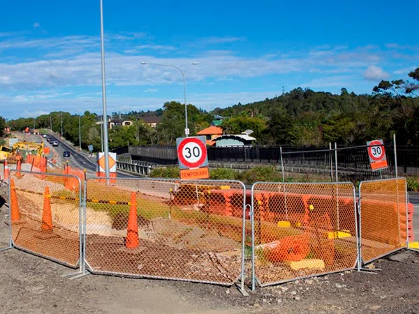 The PVC coated chain link temporary fencing panels are surrounding the construction site.