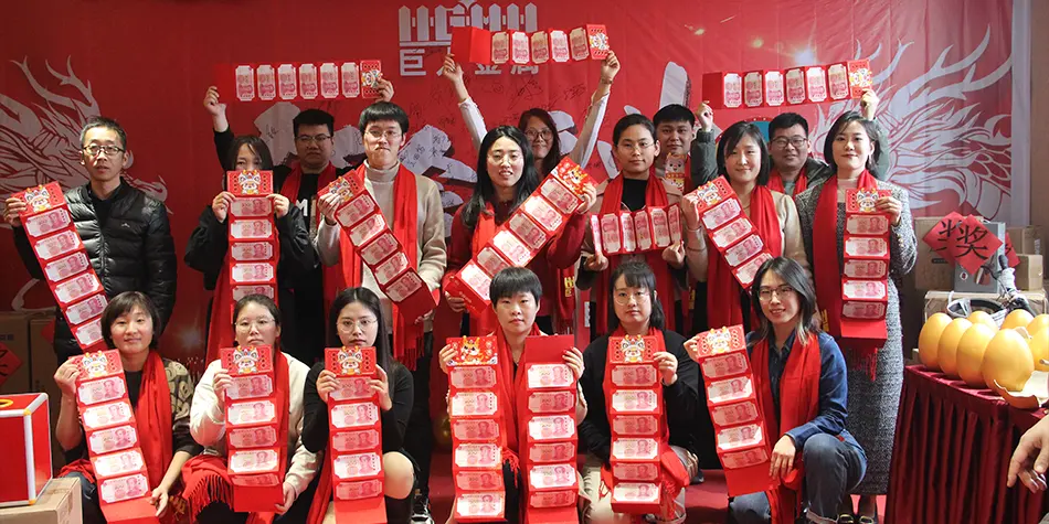 The customer and our sales manager are standing front of the honor wall.