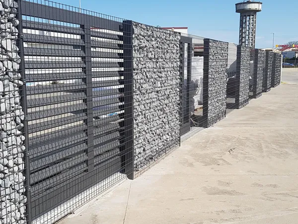 Welded Gabion wall for an industrial site boundary.