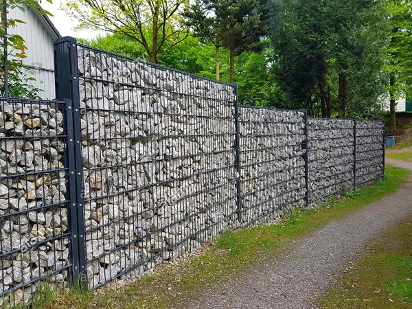 Welded Gabion boundary wall along a roadside.