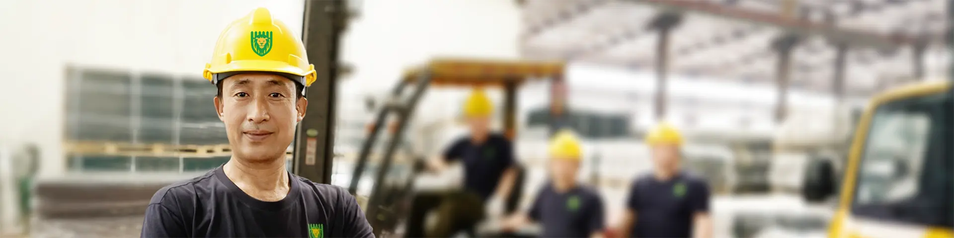 Our workers are standing in the warehouse.