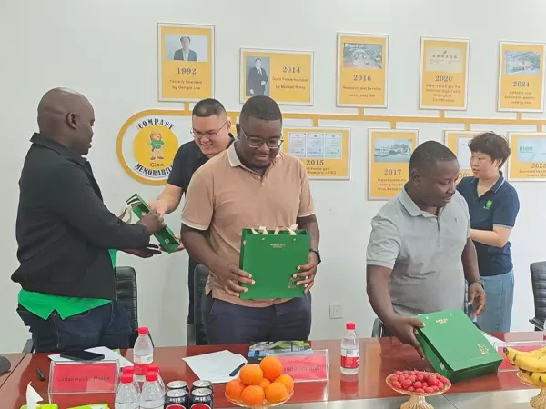 Presenting Zimbabwe clients with traditional Chinese gifts