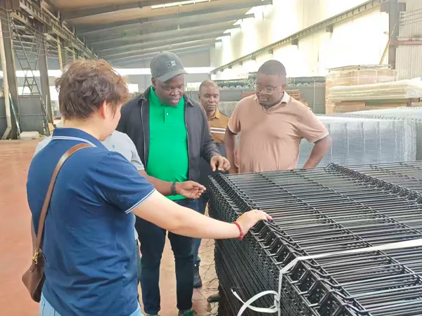 Zimbabwe client visits production workshop